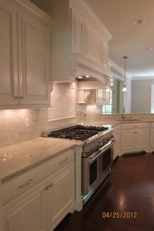 River White Granite with White Cabinets,White Carrara Marble Backsplash and White Ceramic Arabesque Tiles and Costen Floor